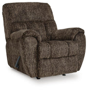 Ashley Furniture Stayfish recliner in closed angle view, showcasing plush cushioning and wooden base design.