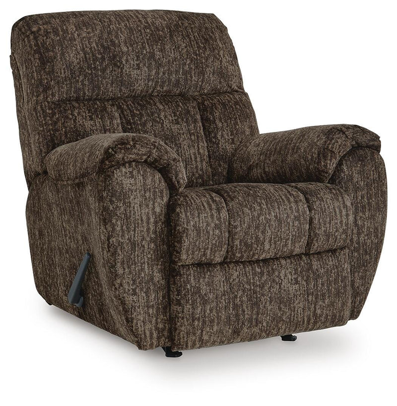Ashley Furniture Stayfish recliner in closed angle view, showcasing plush cushioning and wooden base design.