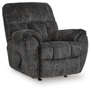 Ashley Furniture Stayfish recliner in closed position, featuring plush upholstery and comfortable armrests from an angled side view.