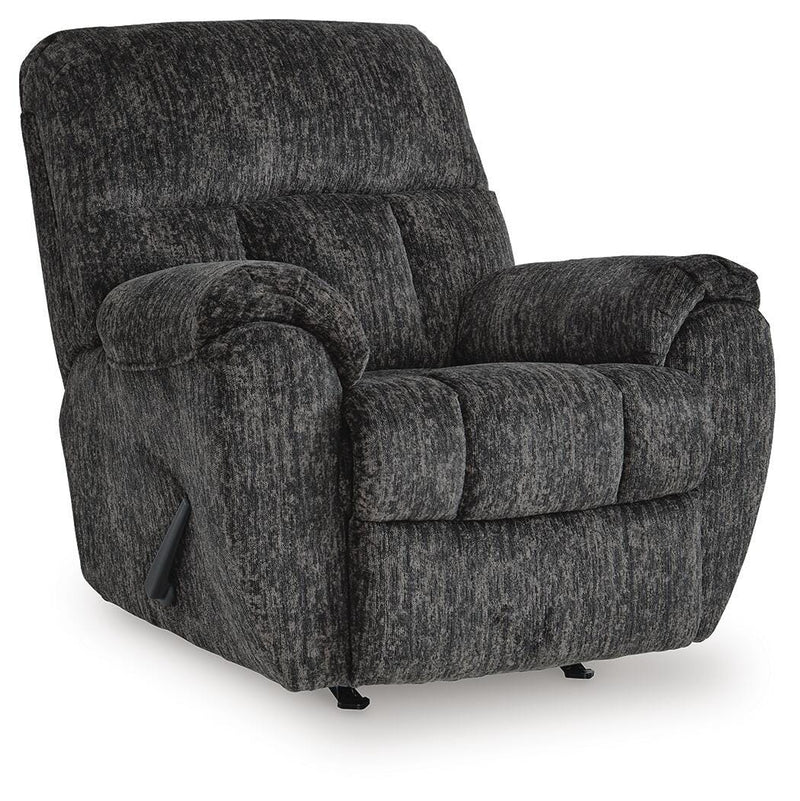 Ashley Furniture Stayfish recliner in closed position, featuring plush upholstery and comfortable armrests from an angled side view.