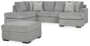 Ashley Furniture Casselbury living room set with plush sofa and matching armchair in a modern design, shown in a cozy living space.