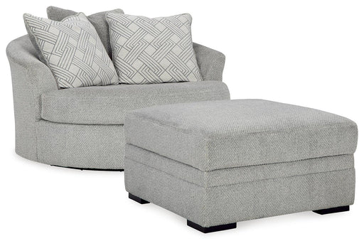 Ashley Furniture Casselbury living room set featuring a sofa and loveseat with plush upholstery and coordinating cushions.