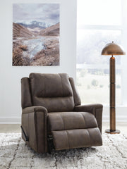 Open Ashley Furniture Lixtowel recliner showing plush beige fabric, padded armrests, and reclining mechanism.