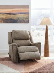 Open Ashley Furniture Lixtowel recliner showing plush fabric and reclining mechanism, perfect for comfortable living room seating.