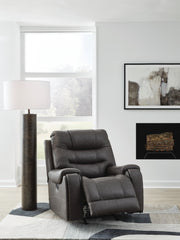 Ashley Furniture Femley recliner in open position, showcasing plush upholstery and comfortable design for living room seating.