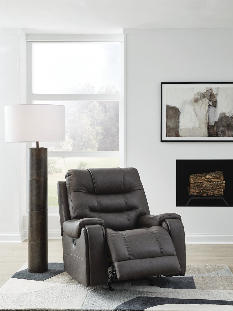 Ashley Furniture Femley recliner in open position, showcasing plush upholstery and comfortable design for living room seating.