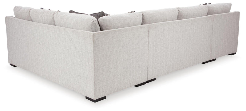 Ashley Furniture Koralynn living room set with a sofa and loveseat, shown from the back in a modern living space.