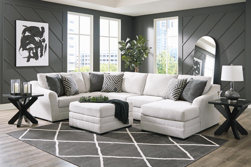 Ashley Furniture Koralynn living room set with sofa and armchair, featuring plush cushions and neutral fabric upholstery.