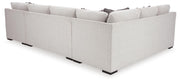 Ashley Furniture Koralynn living room set with sofa and armchair, featuring plush upholstery and modern design.