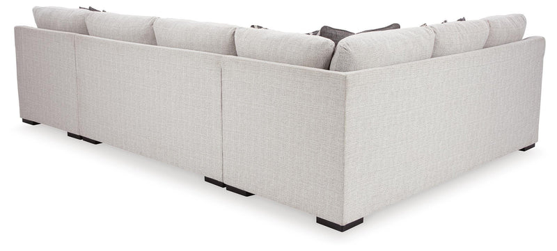 Ashley Furniture Koralynn living room set with sofa and armchair, featuring plush upholstery and modern design.