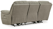 Ashley Furniture Next-Gen Gaucho Power Reclining Sofa with plush fabric and adjustable headrests, shown from the back.