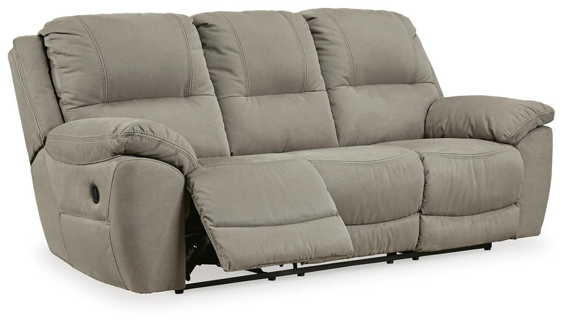 Ashley Furniture Next-Gen Gaucho Reclining Sofa, open view showing plush cushions and reclining mechanism in a modern living room setting.