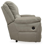 Ashley Furniture Next-Gen Gaucho Reclining Sofa with plush fabric and adjustable headrests, shown from a side view.