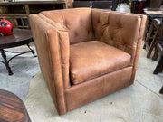 Leather swivel accent chair with tufted upholstery, model 7773L42 by Mayo Furniture, in a stylish, modern design.