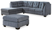 Ashley Furniture Marleton living room set with sofa and loveseat in a modern design, featuring neutral upholstery and wooden legs.