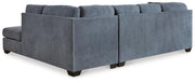 Ashley Furniture Marleton living room set with sofa and armchair, shown from the back angle in a modern living space.