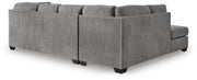 Ashley Furniture Marleton living room set featuring a sofa and armchair with neutral upholstery and wooden legs.