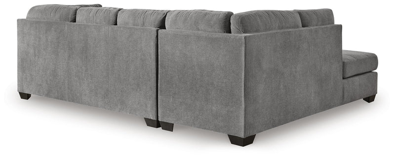 Ashley Furniture Marleton living room set featuring a sofa and armchair with neutral upholstery and wooden legs.
