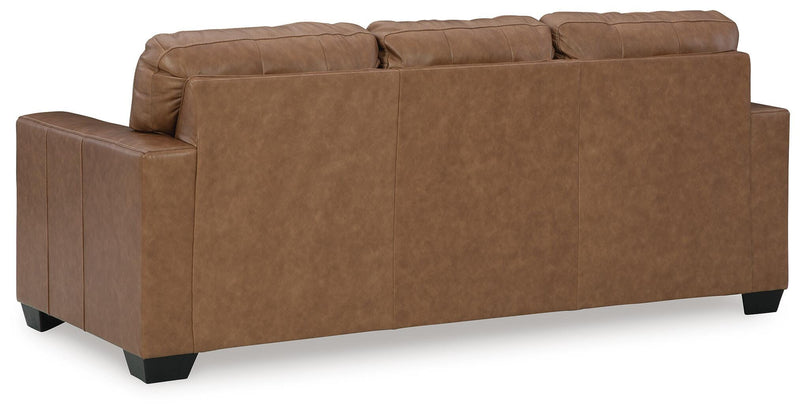 Ashley Furniture Bolsena Sofa Sleeper with plush fabric and back cushions, shown in a living room setting.