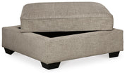 Ashley Furniture Bovarian living room set with sofa and loveseat, featuring plush cushions and dark wood legs.