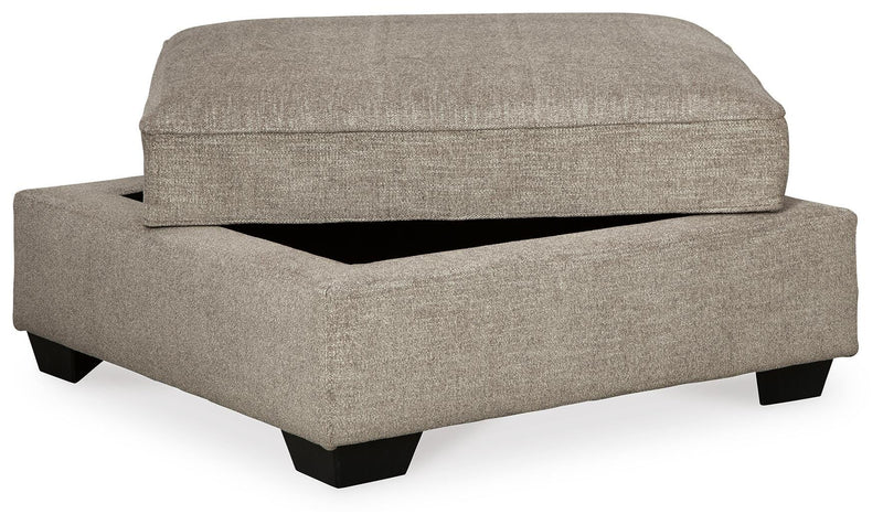 Ashley Furniture Bovarian living room set with sofa and loveseat, featuring plush cushions and dark wood legs.