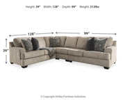 Ashley Furniture Bovarian living room set featuring a sofa, loveseat, and armchair with neutral upholstery and wooden accents.