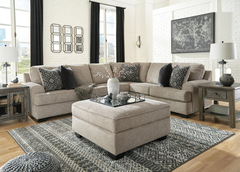 Ashley Furniture Bovarian living room set featuring a sofa, loveseat, and armchair with plush upholstery and contemporary design.
