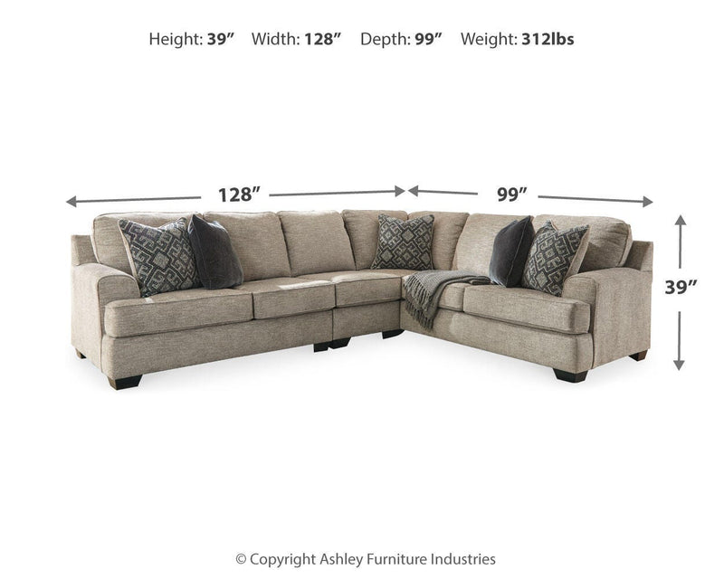 Ashley Bovarian living room set featuring a sofa and armchair with beige upholstery and decorative cushions.
