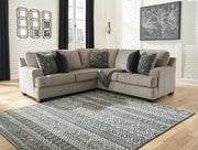 Ashley Furniture Bovarian sectional sofa with plush cushions and modern design, shown in a neutral fabric.