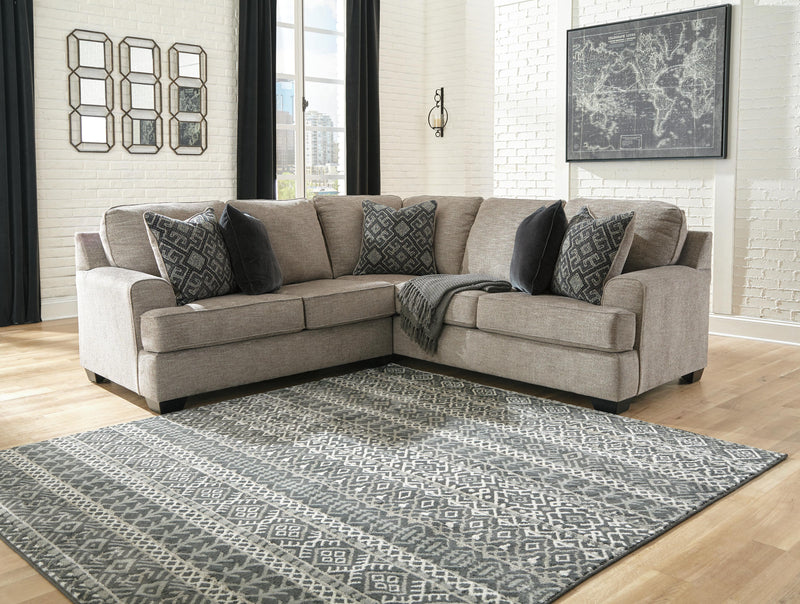 Ashley Furniture Bovarian sectional sofa with plush cushions and modern design, shown in a neutral fabric.