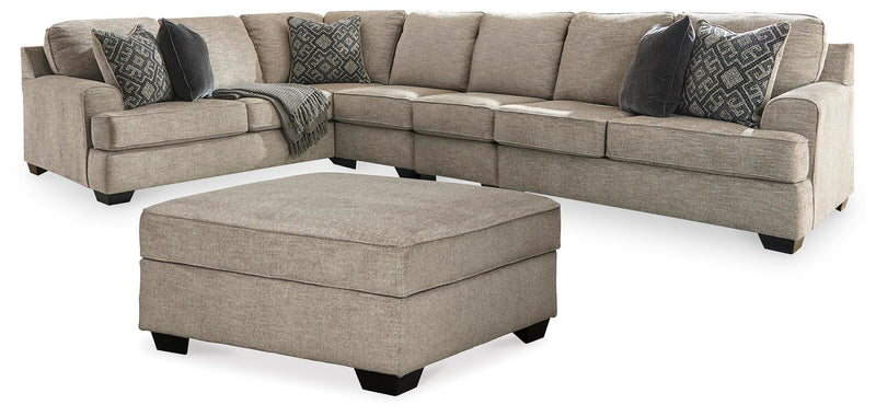 Ashley Furniture Bovarian living room set with sofa and loveseat featuring plush cushions and neutral upholstery.
