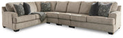 Ashley Furniture Bovarian living room set with sofa and loveseat, featuring neutral upholstery and wooden legs.