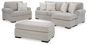 Ashley Furniture Eastonbridge living room set with sofa and armchair in a modern design, featuring neutral fabric upholstery.