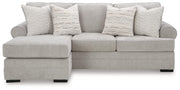 Ashley Furniture Eastonbridge living room set with a sofa and armchair, featuring plush cushions and neutral fabric.
