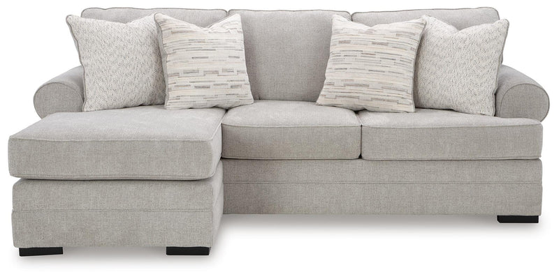 Ashley Furniture Eastonbridge living room set with a sofa and armchair, featuring plush cushions and neutral fabric.