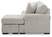 Ashley Furniture Eastonbridge living room set with sofa and loveseat, featuring neutral fabric upholstery and modern design.