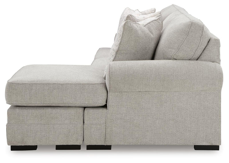 Ashley Furniture Eastonbridge living room set with sofa and loveseat, featuring neutral fabric upholstery and modern design.