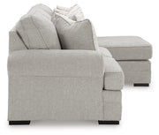 Ashley Furniture Eastonbridge Living Room Set with sofa and loveseat in a modern design, photographed in a well-lit living room setting.