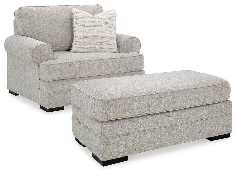 Ashley Furniture Eastonbridge living room set with sofa and armchair in a modern design, featuring neutral fabric upholstery.