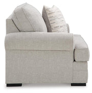 Ashley Furniture Eastonbridge living room set featuring a sofa and loveseat with neutral fabric upholstery and wooden accents.