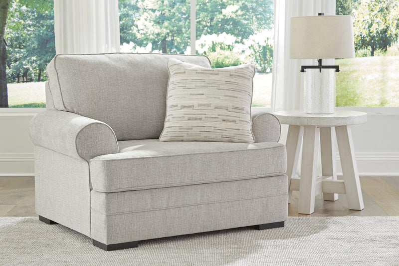 Ashley Furniture Eastonbridge living room set with sofa, loveseat, and armchair in a modern design, shown in a cozy living space.