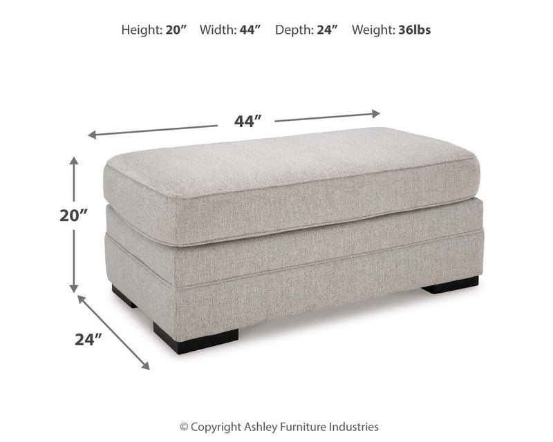 Eastonbridge living room set by Ashley Furniture featuring a sofa, loveseat, and armchair with neutral upholstery and modern design.