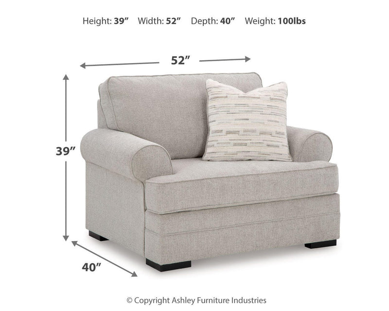 Ashley Furniture Eastonbridge living room set featuring a sofa, loveseat, and armchair with neutral upholstery and wooden legs.