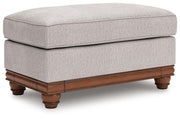 Ashley Furniture Clearbrooke living room set with a sofa and loveseat, featuring neutral upholstery and modern design.