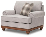 Ashley Furniture Clearbrooke living room set with sofa and armchair, featuring neutral upholstery and modern design.