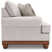 Ashley Furniture Clearbrooke living room set with a sofa and armchair in a modern design, featuring neutral upholstery and wooden legs.
