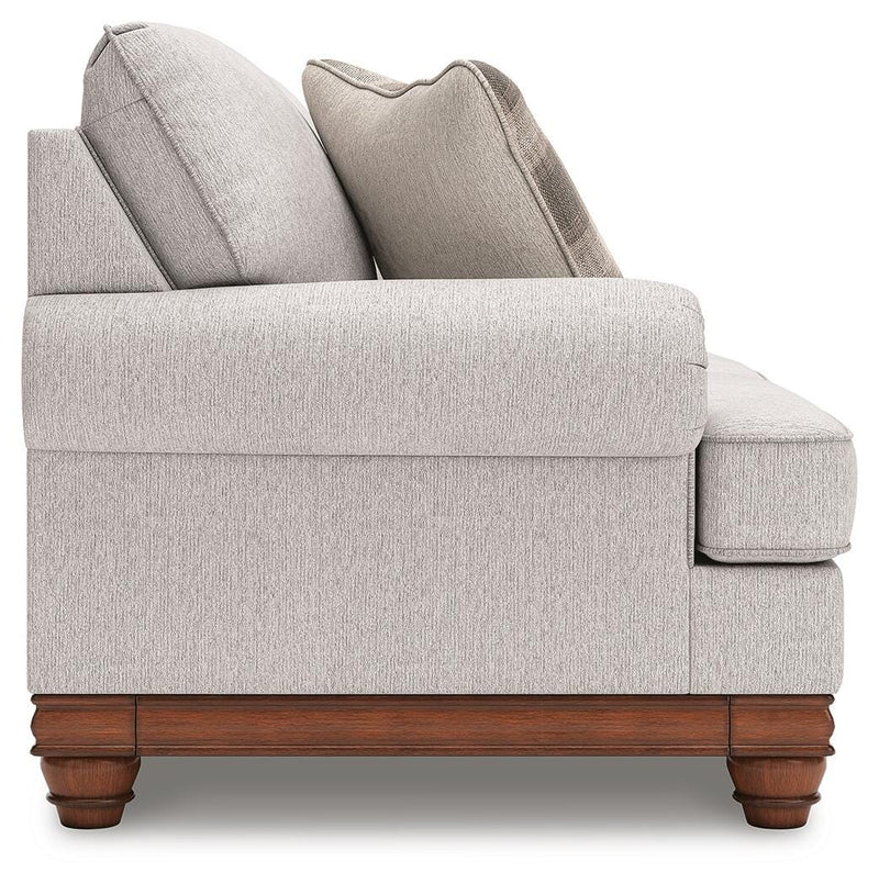Ashley Furniture Clearbrooke living room set with a sofa and armchair in a modern design, featuring neutral upholstery and wooden legs.
