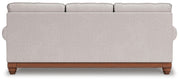 Ashley Furniture Clearbrooke Living Room Set featuring a sofa and armchair with plush cushions and neutral upholstery.