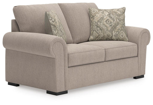 Ashley Furniture Sararose loveseat showing plush fabric upholstery, cushioned armrests, and a stylish modern design.