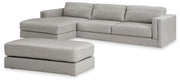 Ashley Furniture Amiata upholstery package for living room set, featuring fabric cushions and stylish armrests in natural tones.